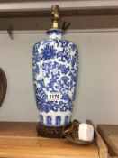 A blue and white pottery lamp base.