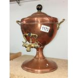 A copper samovar urn.
