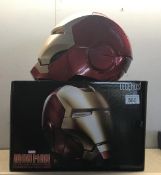 A boxed Marvel legends series electronic helmet.