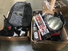 A box of Star Wars toys, figures and memorabilia.
