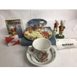 A collection of Rupert the bear figurines & pottery items including Beswick Rupert, wade Rupert,