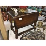 A small oak drop leaf table.