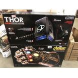 A boxed Marvel electric Thor hammer & a boxed Marvel Avengers Infinity gauntlet.