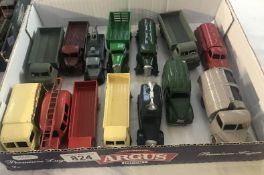 14 playworn Dinky commercial vehicles mostly repainted.
