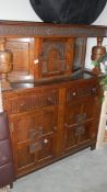 An oak court cupboard