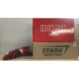 A boxed Iron Man wearable blaster gauntlet in Stark Industries outer box, by Cattoys CC.