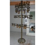 An earring stand and earrings.