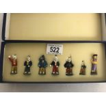 A set of 7 Rupert the bear painted lead miniatures.