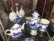 5 items of blue and white including teapot, vase etc.