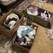 4 boxes of assorted dolls.