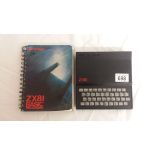 A 1980s Sinclair ZX81 computer and basic programming book.