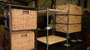 A 2 tier metal and wicker stand with 2 matching chests of drawers.