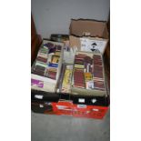 4 boxes of collector's match boxes.