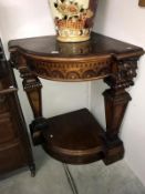 A mahogany corner stand.