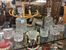 2 cut glass decanters and 6 cut glass whisky tumblers.