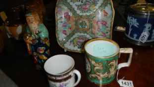 A Chinese plate, a figure and 2 mugs.