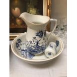 A blue and white jug and basin set.