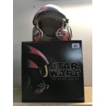 A boxed Star Wars The Black Series Poe Dameron helmet.