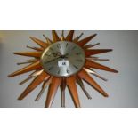 A sunburst wall clock.