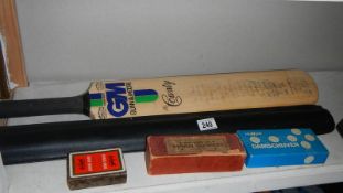 A signed cricket bat, dominoes etc.