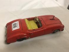 A 1960's battery operated tinplate Mercedes 190sl, made in Germany by "Huki".