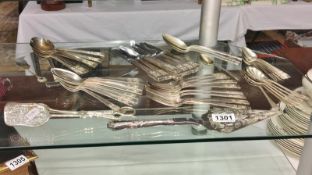 A 44 piece silver plated cutlery set, cake slice, sandwich tongs etc.