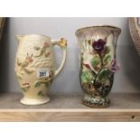 A Price Bros. jug and a floral decorated vase.