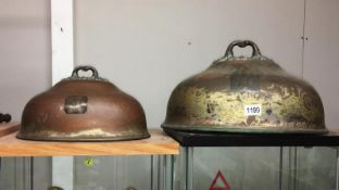 2 old metal meat covers.