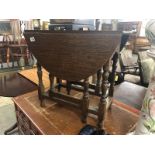 A small oak drop leaf table.