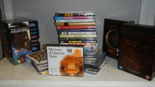 A shelf of DVD's and CD's.