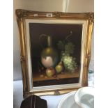 A gilt framed still life study.