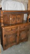 An oak court cupboard.