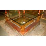 A large glass topped coffee table.