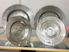 4 old pewter plates.