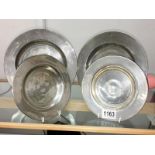 4 old pewter plates.