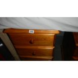 A pine 3 drawer bedside chest.