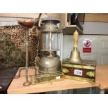 A hurricane lamp, bell, boxes etc.