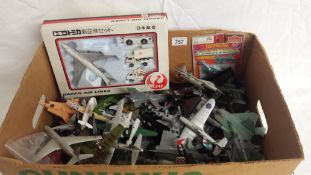 A large quantity of unboxed diecast aircraft.