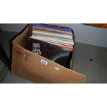 A box of LP records.