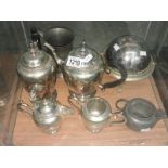 A 4 piece silver plate tea set, a silver plate muffin dish, a pewter tankard,