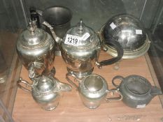 A 4 piece silver plate tea set, a silver plate muffin dish, a pewter tankard,