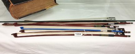 7 violin bows.