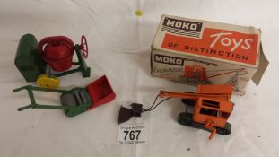 A boxed Moko excavator (a/f), cement mixer and lawn mower.