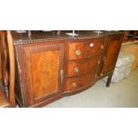 A mahogany sideboard.