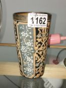 A Doulton Lambeth 1881 decorated tumbler with white on grey and pink on black alternative panels.