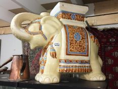 A pottery elephant seat.