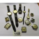 A quantity of old wrist watches and watch heads including spares.