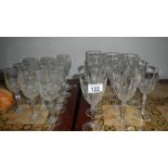 A quantity of assorted wine glasses.