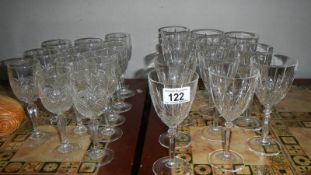 A quantity of assorted wine glasses.