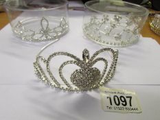 3 jewelled tiara's.